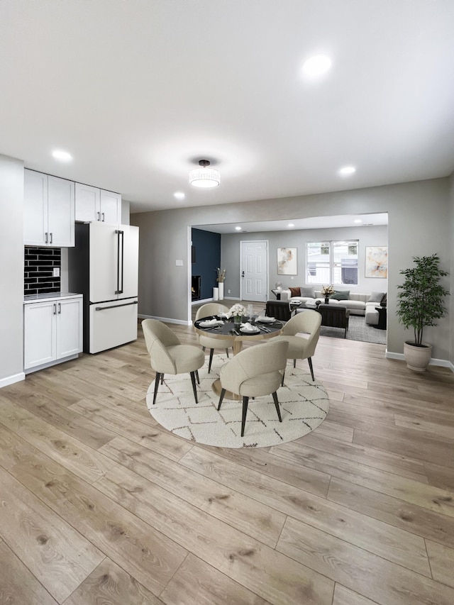 20283 Lancaster St, Harper Woods, MI 48225 - dining area featuring light wood-style flooring and recessed lighting