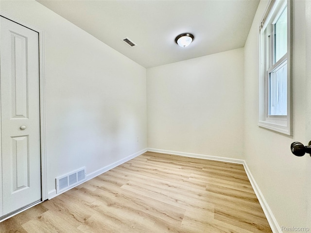 4915 Clarkston Rd, Clarkston, MI 48348 - unfurnished room featuring wood finished floors and baseboards