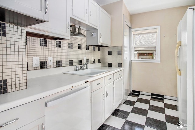 5369 Weddell St, Dearborn Heights, MI 48125 - kitchen featuring white appliances, dark flooring, light countertops, and backsplash