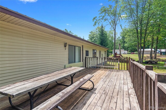 4175 Cherokee St, Gladwin, MI 48624 - wooden terrace with a yard