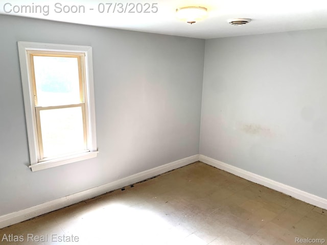 6201 S Main St, Clarkston, MI 48346 - empty room with healthy amount of natural light