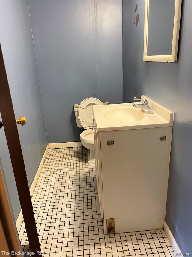 1934 Rockcreek Ln, Flint, MI 48507 - bathroom featuring vanity and tile patterned flooring