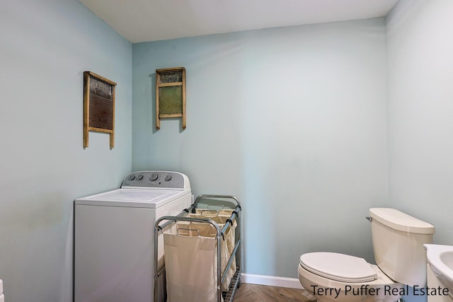 721 17 Mile Rd, Kent City, MI 49330 - laundry room with washer / dryer and baseboards