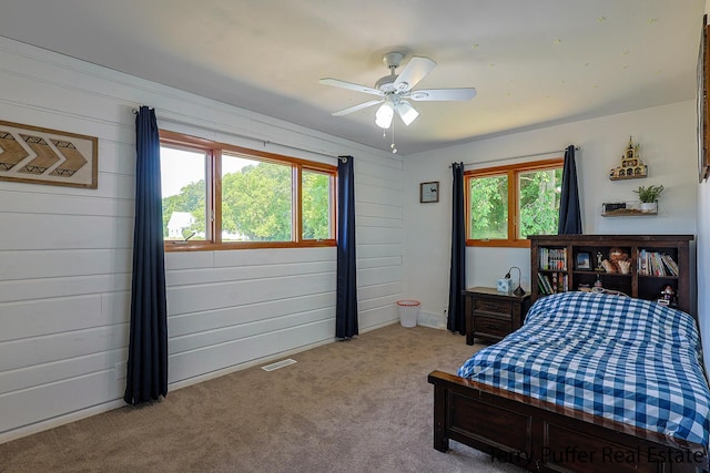 721 17 Mile Rd, Kent City, MI 49330 - carpeted bedroom with ceiling fan