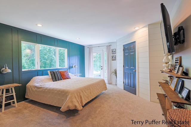 721 17 Mile Rd, Kent City, MI 49330 - carpeted bedroom with access to outside, a decorative wall, and recessed lighting