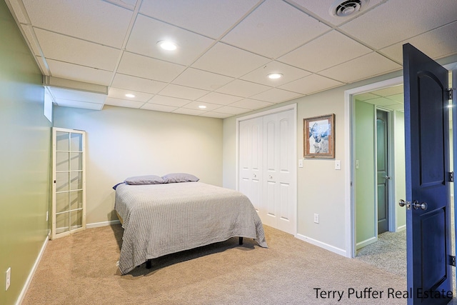 721 17 Mile Rd, Kent City, MI 49330 - carpeted bedroom featuring a drop ceiling and a closet