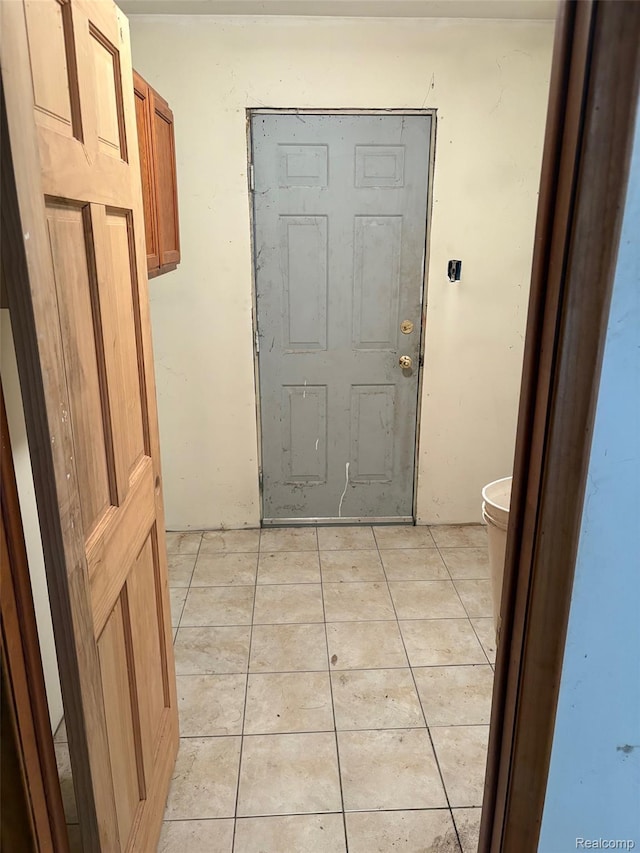 1185 E Hughes Lake Rd, Rose City, MI 48654 - corridor featuring light tile patterned flooring