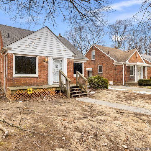 19405 Pierson St, Detroit, MI 48219 - bungalow-style home featuring brick siding and a shingled roof
