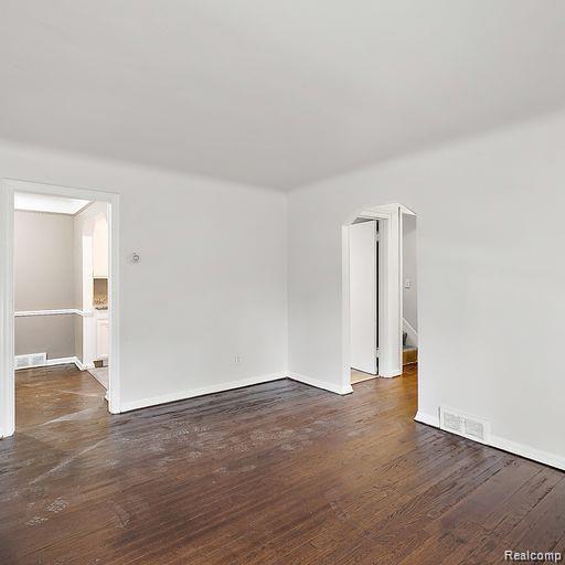 19405 Pierson St, Detroit, MI 48219 - spare room with wood finished floors and baseboards