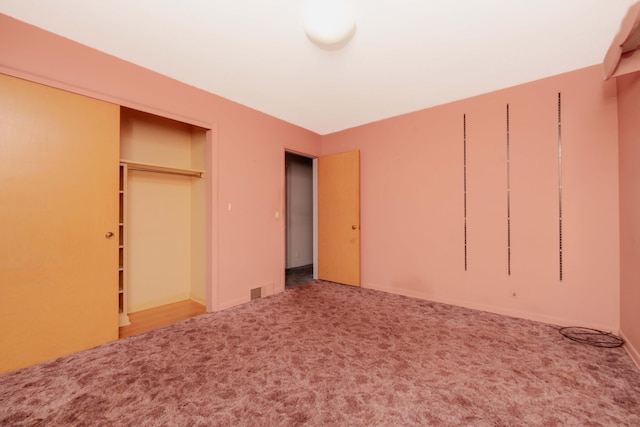 1129 Par 4 Cir, Kalamazoo, MI 49008 - unfurnished bedroom featuring carpet floors and a closet