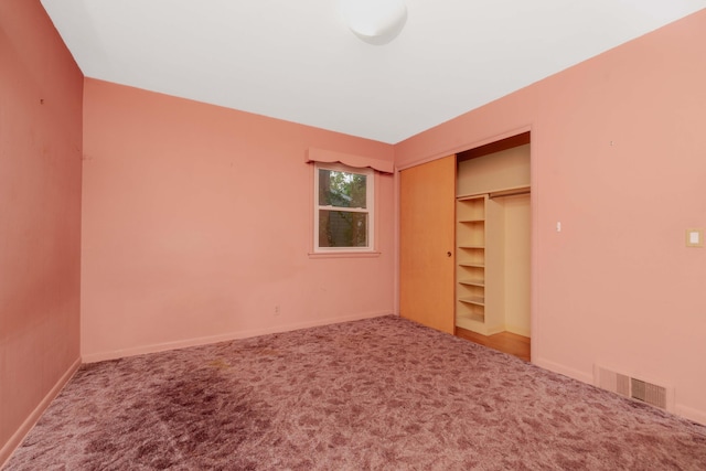 1129 Par 4 Cir, Kalamazoo, MI 49008 - unfurnished bedroom with carpet and a closet
