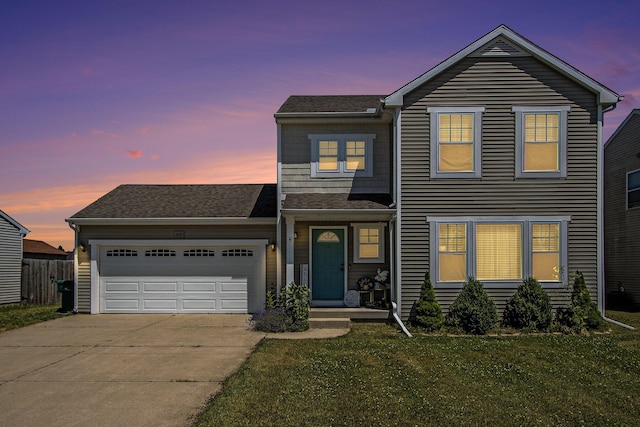 1619 Ives Mill Ln, Vicksburg, MI 49097 - traditional home with driveway, an attached garage, a front yard, and roof with shingles