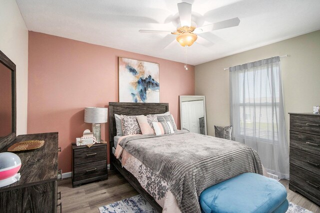 1619 Ives Mill Ln, Vicksburg, MI 49097 - bedroom with wood finished floors and ceiling fan
