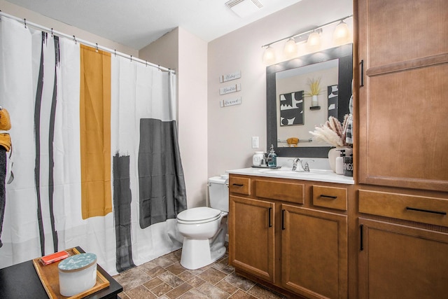 1619 Ives Mill Ln, Vicksburg, MI 49097 - bathroom with stone finish floors, vanity, and a shower with curtain
