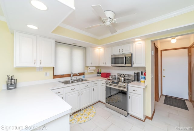 25759 Hunt Club Blvd, Farmington, MI 48335 - kitchen featuring appliances with stainless steel finishes, light countertops, white cabinets, ornamental molding, and light tile patterned flooring