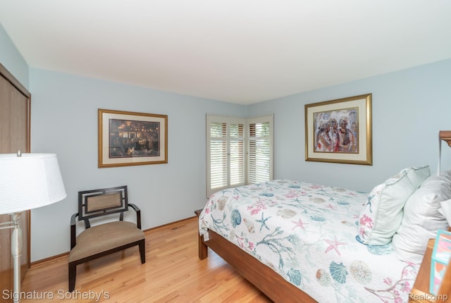 25759 Hunt Club Blvd, Farmington, MI 48335 - bedroom featuring light wood-style flooring and baseboards