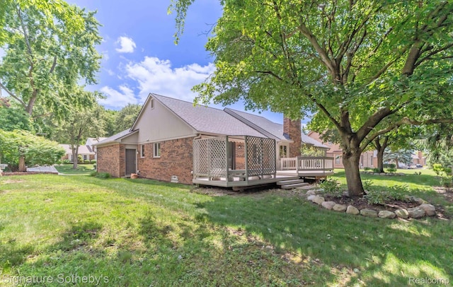 25759 Hunt Club Blvd, Farmington, MI 48335 - view of property exterior featuring a deck, brick siding, a lawn, and a chimney