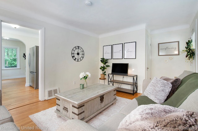 9309 Newburgh Rd, Livonia, MI 48150 - living room featuring light wood-style floors and baseboards