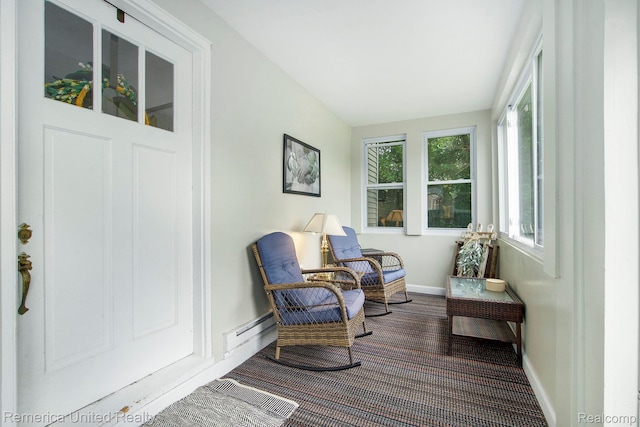 9309 Newburgh Rd, Livonia, MI 48150 - sunroom featuring a baseboard heating unit and carpet floors