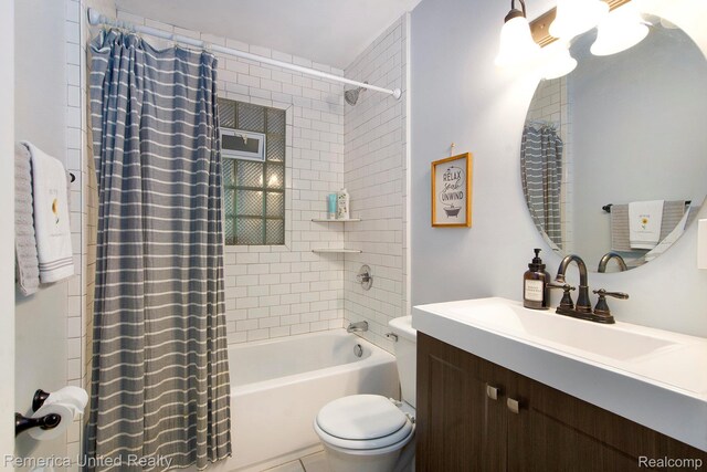9309 Newburgh Rd, Livonia, MI 48150 - bathroom featuring vanity, shower / bath combo with shower curtain, and tile patterned floors