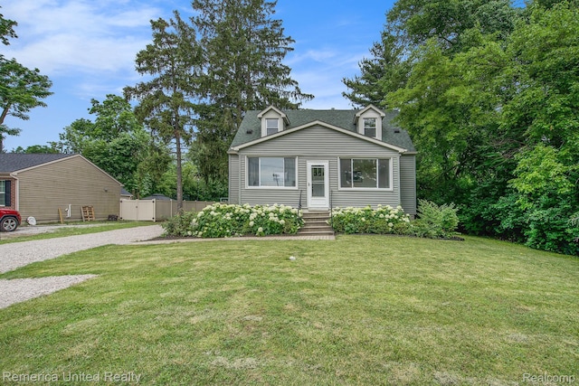 9309 Newburgh Rd, Livonia, MI 48150 - cape cod house with a gate, gravel driveway, entry steps, and a shingled roof
