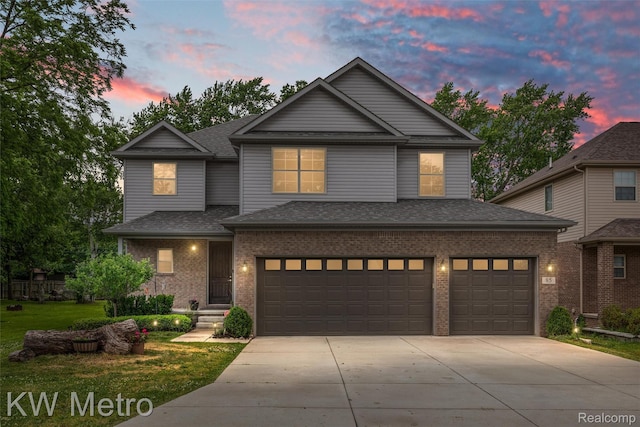 85 Hickory Dr, Troy, MI 48083 - view of front of home with driveway, brick siding, a garage, roof with shingles, and a yard