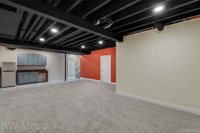 85 Hickory Dr, Troy, MI 48083 - finished basement featuring freestanding refrigerator and light carpet