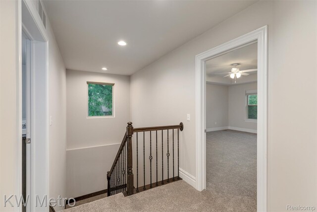 85 Hickory Dr, Troy, MI 48083 - hallway with an upstairs landing, carpet floors, and recessed lighting