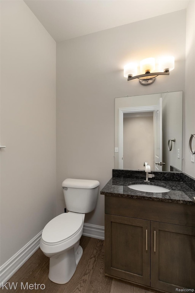 85 Hickory Dr, Troy, MI 48083 - bathroom with wood finished floors and vanity