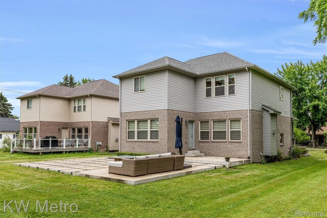 85 Hickory Dr, Troy, MI 48083 - back of property with brick siding, a yard, a patio, and a deck
