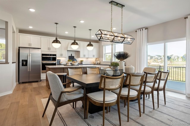 873 Risdon Trl S, Saline, MI 48176 - dining room with light wood-style flooring and recessed lighting