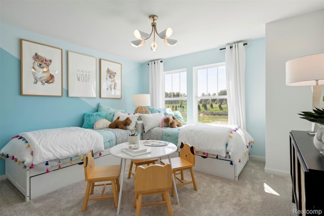 873 Risdon Trl S, Saline, MI 48176 - carpeted bedroom featuring a chandelier