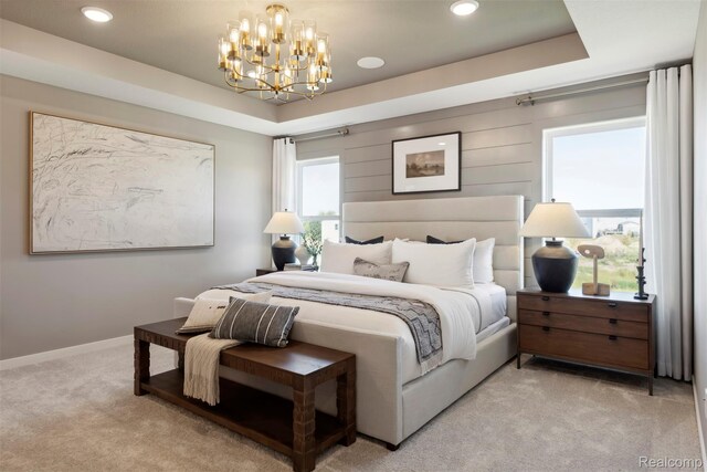 873 Risdon Trl S, Saline, MI 48176 - bedroom featuring light colored carpet, a chandelier, a tray ceiling, and recessed lighting