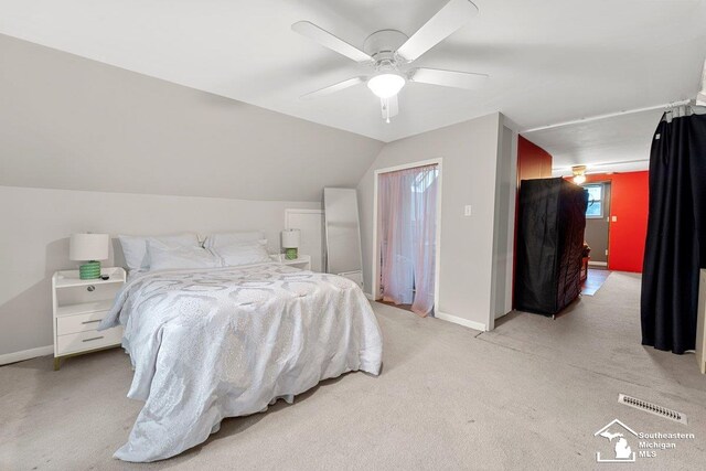 7395 Center St, Newport, MI 48166 - bedroom featuring light carpet, ceiling fan, and vaulted ceiling