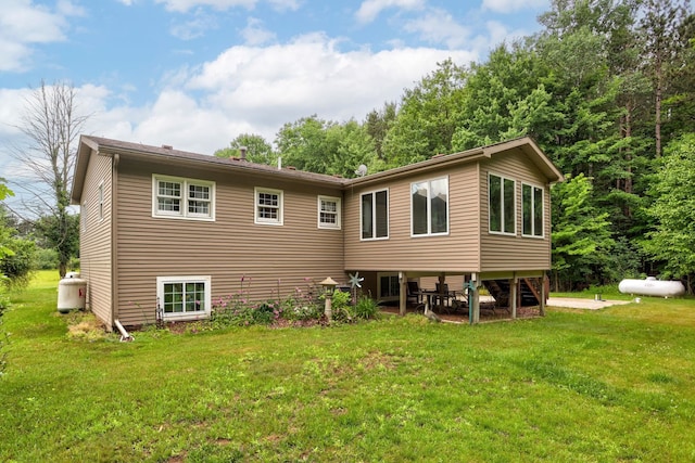 5852 Pinkerton Rd, Vassar, MI 48768 - rear view of house with a yard