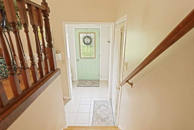 5852 Pinkerton Rd, Vassar, MI 48768 - foyer entrance featuring light tile patterned floors and baseboards