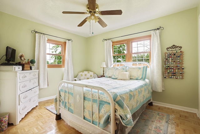 5852 Pinkerton Rd, Vassar, MI 48768 - bedroom with multiple windows and a ceiling fan