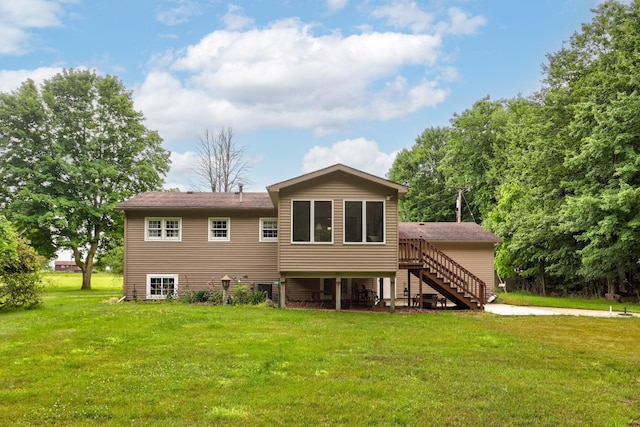 5852 Pinkerton Rd, Vassar, MI 48768 - back of house with stairs and a lawn