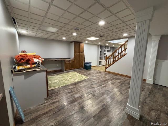 171 Golfview Dr, Caro, MI 48723 - finished basement featuring stairs and wood finished floors