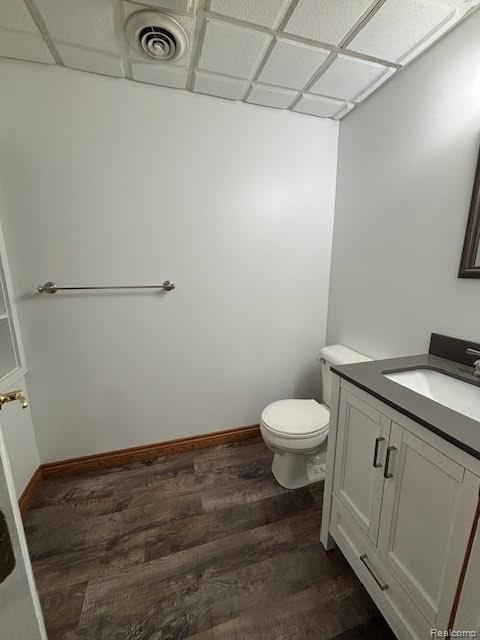 171 Golfview Dr, Caro, MI 48723 - half bath with wood finished floors and vanity