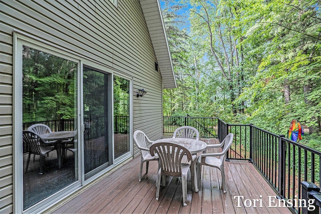 4366 Woods Rd, Sidney, MI 48885 - deck with outdoor dining space