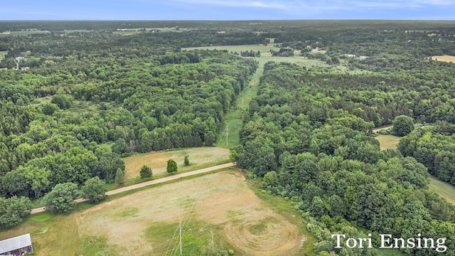 4366 Woods Rd, Sidney, MI 48885 - aerial view of property and surrounding area featuring a heavily wooded area