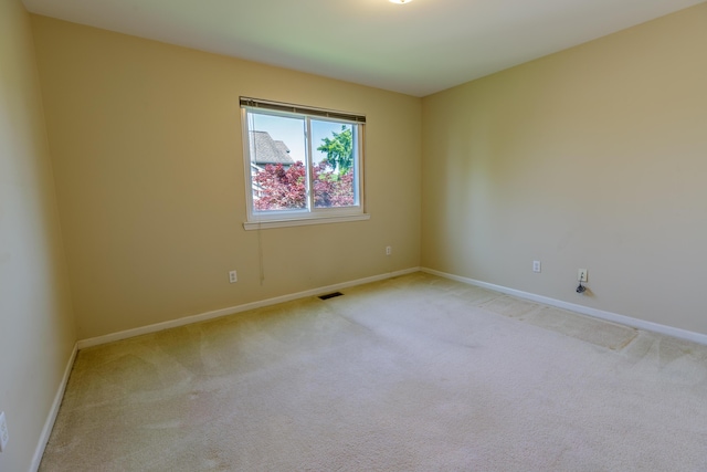 2683 Mystic Dr, Ann Arbor, MI 48103 - spare room featuring light carpet and baseboards