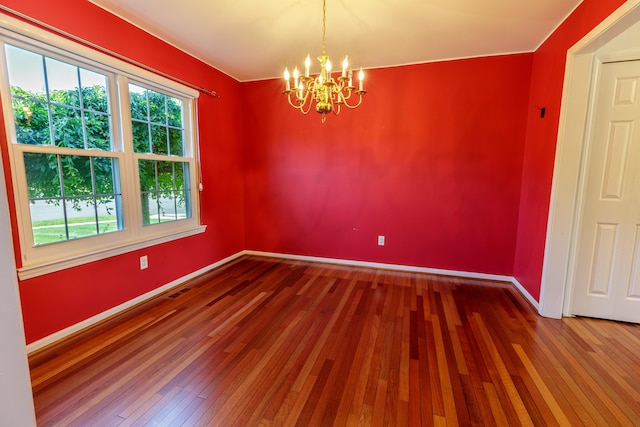 2683 Mystic Dr, Ann Arbor, MI 48103 - spare room featuring a chandelier and hardwood / wood-style flooring
