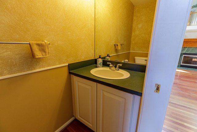 2683 Mystic Dr, Ann Arbor, MI 48103 - half bath featuring wood finished floors and vanity