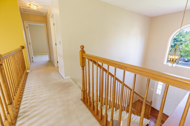 2683 Mystic Dr, Ann Arbor, MI 48103 - hallway with an upstairs landing, light carpet, and attic access