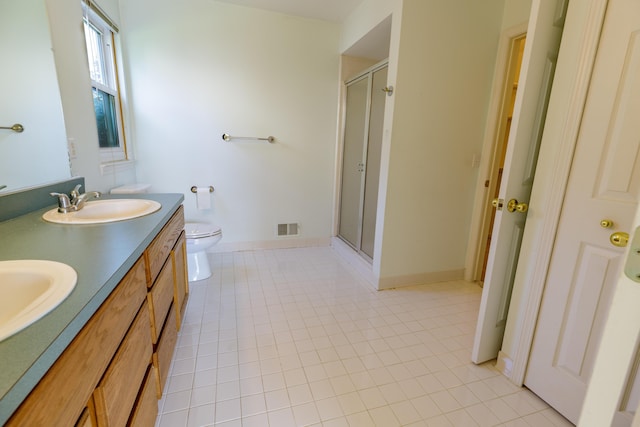 2683 Mystic Dr, Ann Arbor, MI 48103 - bathroom featuring tile patterned flooring, a shower stall, and double vanity