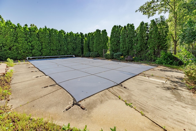 2683 Mystic Dr, Ann Arbor, MI 48103 - view of pool featuring a wooded view and a patio