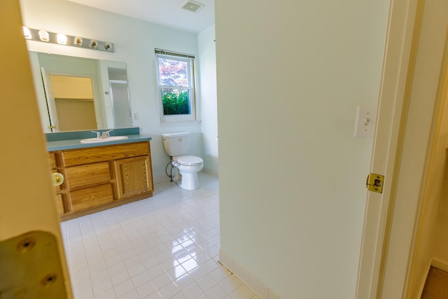 2683 Mystic Dr, Ann Arbor, MI 48103 - bathroom with tile patterned floors, vanity, and a shower with shower door