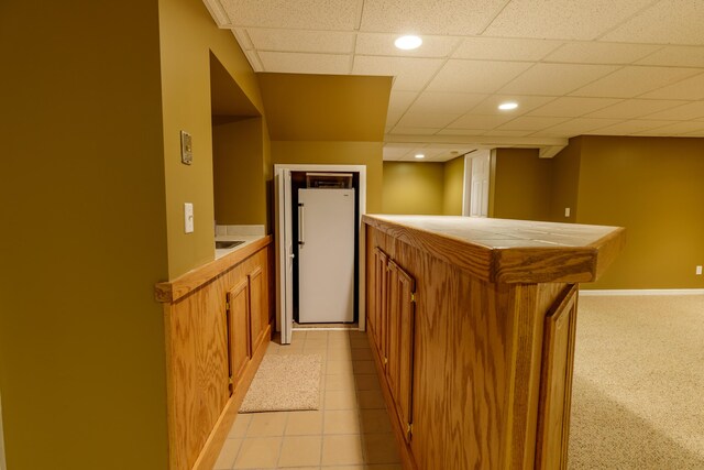 2683 Mystic Dr, Ann Arbor, MI 48103 - indoor dry bar featuring freestanding refrigerator, a drop ceiling, light colored carpet, and recessed lighting